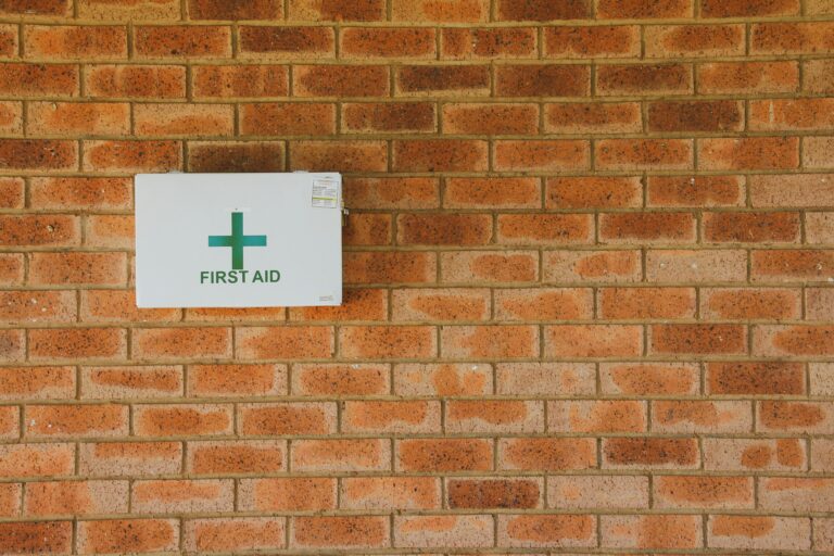Workplace first-aid kit with naloxone available for emergency response